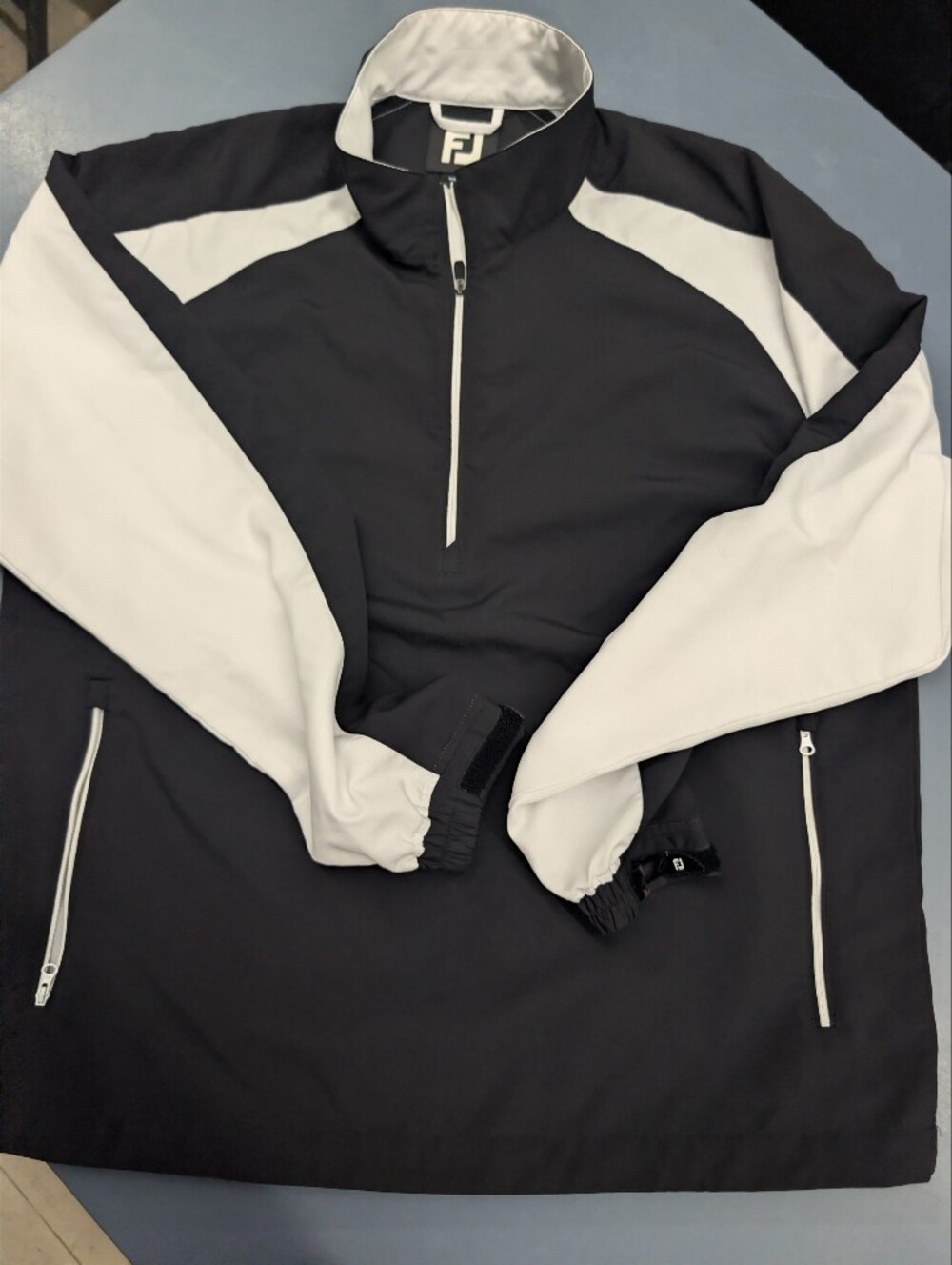 Men’s Black and White FootJoy Colorblock Half-Zip Windbreaker